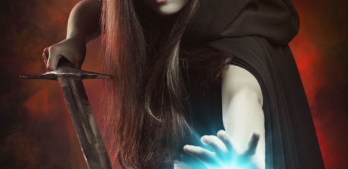 36774374 - beautiful sorceress in fighting position with sword . fantasy and magic